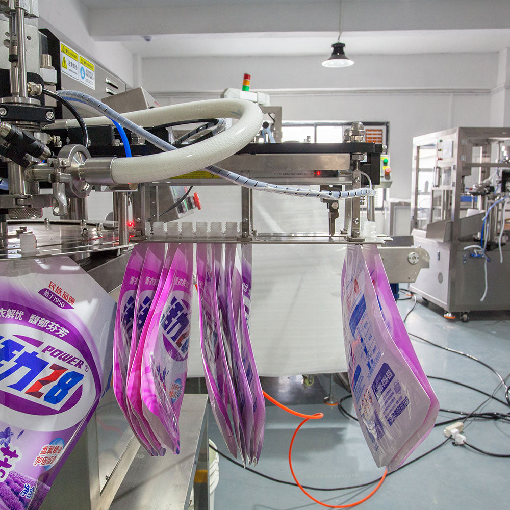 Automatic Spout Pouch Squeeze Pouch Rotary Liquid Filling Capping Machine