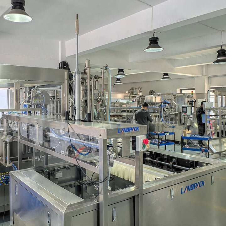 Spout Pouch Filling Capping Machine With CIP and Pouch Feeding System