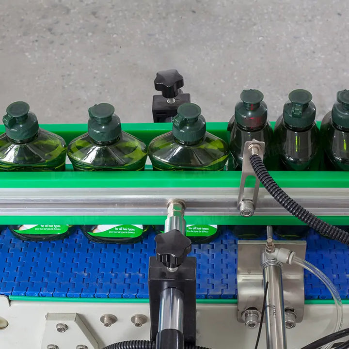 Automatic Liquid Hair Care Oil Bottle Filling Capping Labeling Line With Shrinking Machine