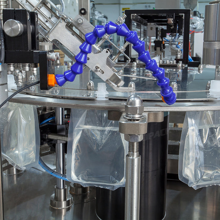 High Speed Double Heads Liquid Spout Pouch Squeeze Pouch Rotary Filling Capping Machine