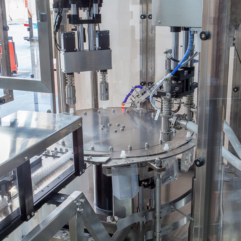 High Speed Double Heads Liquid Spout Pouch Squeeze Pouch Rotary Filling Capping Machine